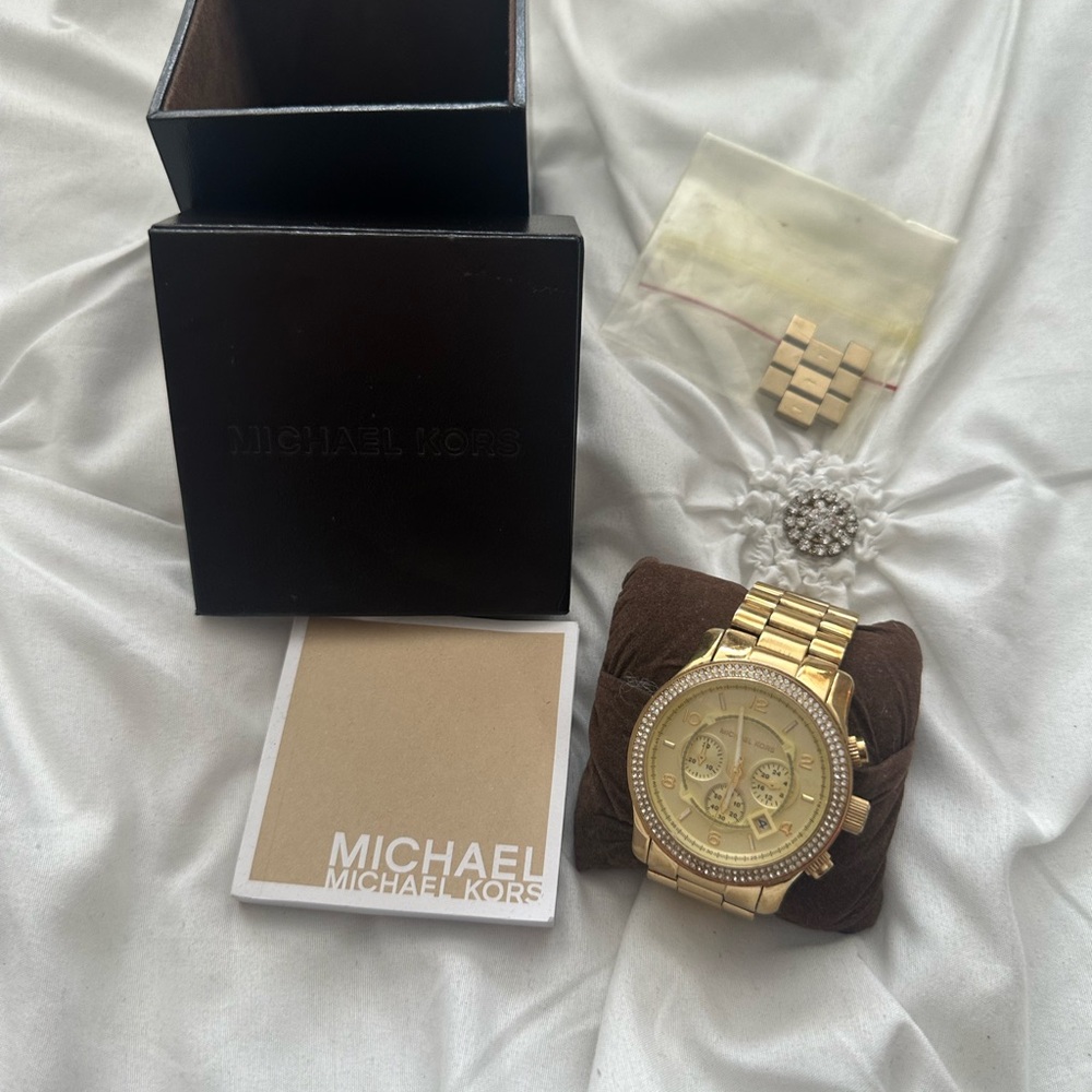 Large Women’s Michael Kors Gold watch with Diamond Bezel